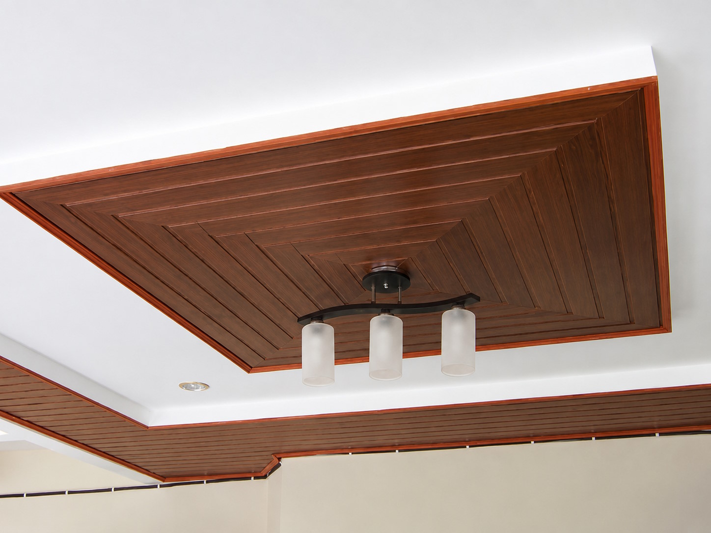 WPC wood-grain ceiling panel installation